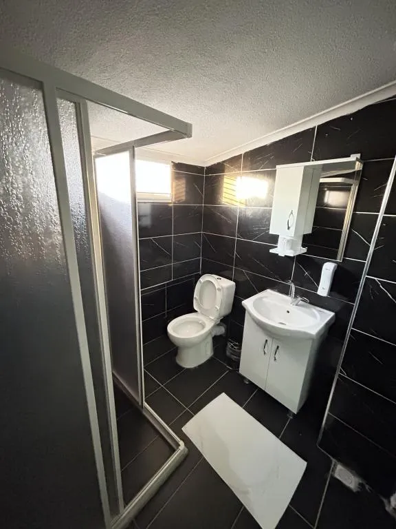 Deluxe Üç Kişilik Oda ,Deniz ve Şehir Manzaralı,Klimalı