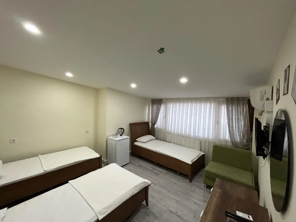 Deluxe Üç Kişilik Oda ,Deniz ve Şehir Manzaralı,Klimalı