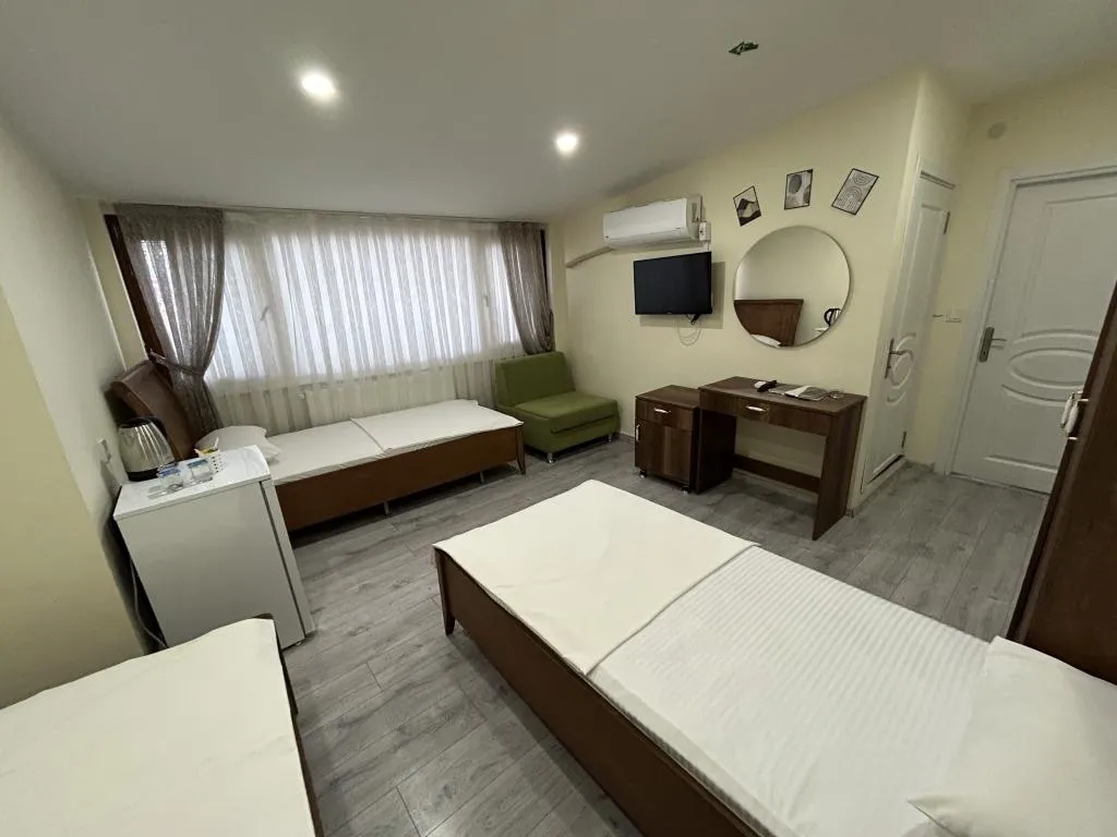 Deluxe Üç Kişilik Oda ,Deniz ve Şehir Manzaralı,Klimalı