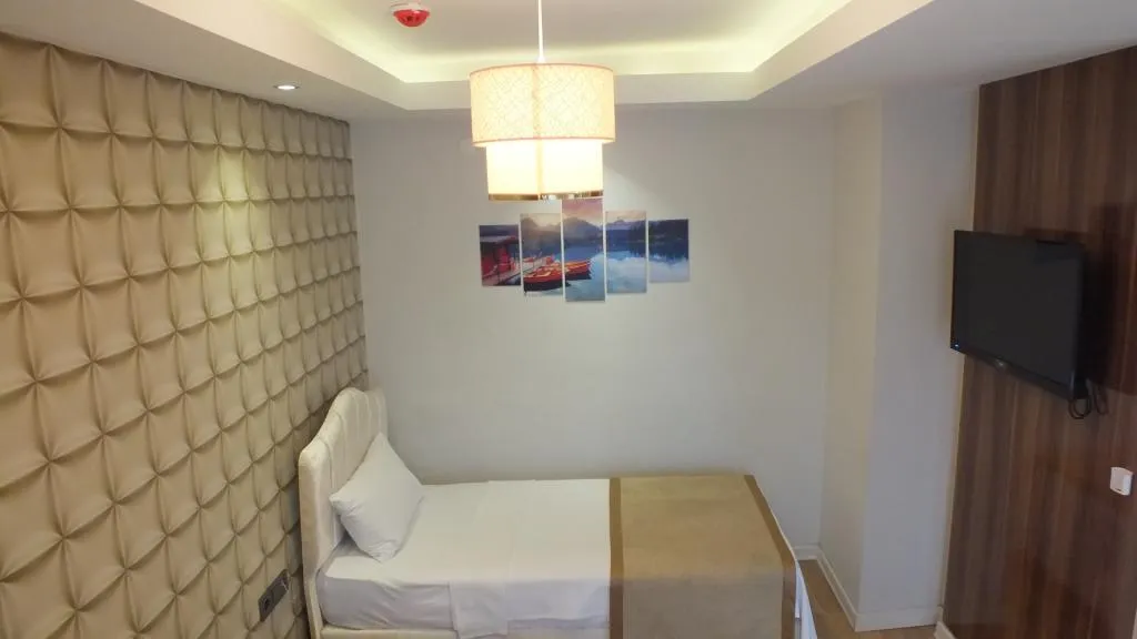 Üç Kişilik Oda