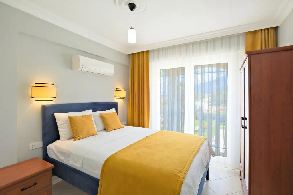 ÜÇ YATAK ODALI DAİRE (BALKONLU )