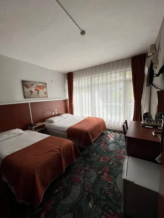 Üç Kişilik Oda