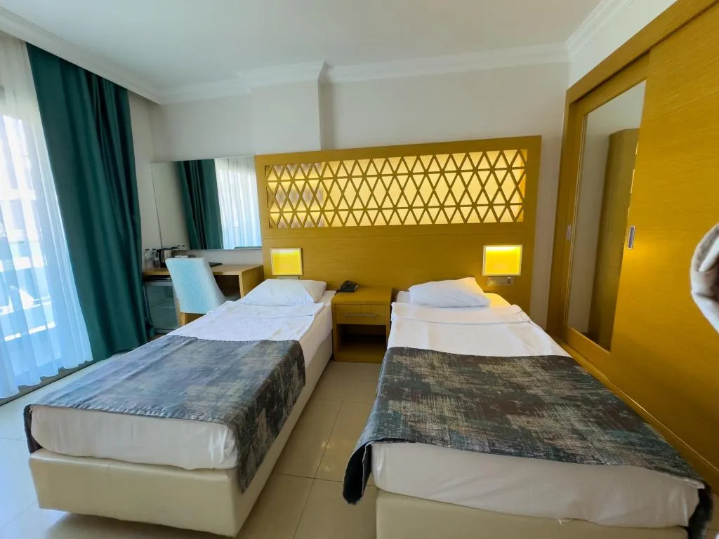 3 Kişilik Deluxe Plus seaview oda