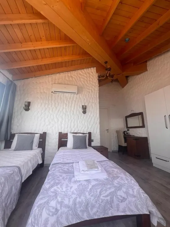 Çatı Katı Oda - İki Ayrı Yataklı,Deniz Manzaralı,Balkonlu