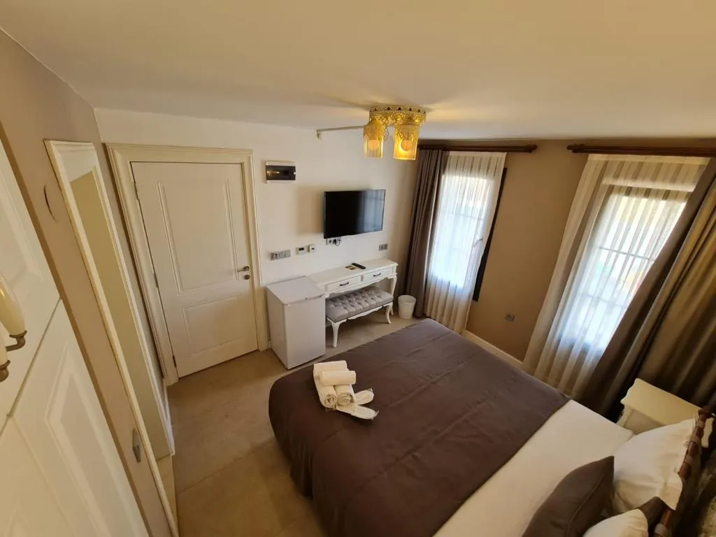 Deluxe Aile Odası,Bahçe Manzaralı,Bahçe Katı