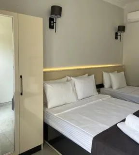 Üç Kişilik Oda,Bahçe Manzaralı,Balkonlu