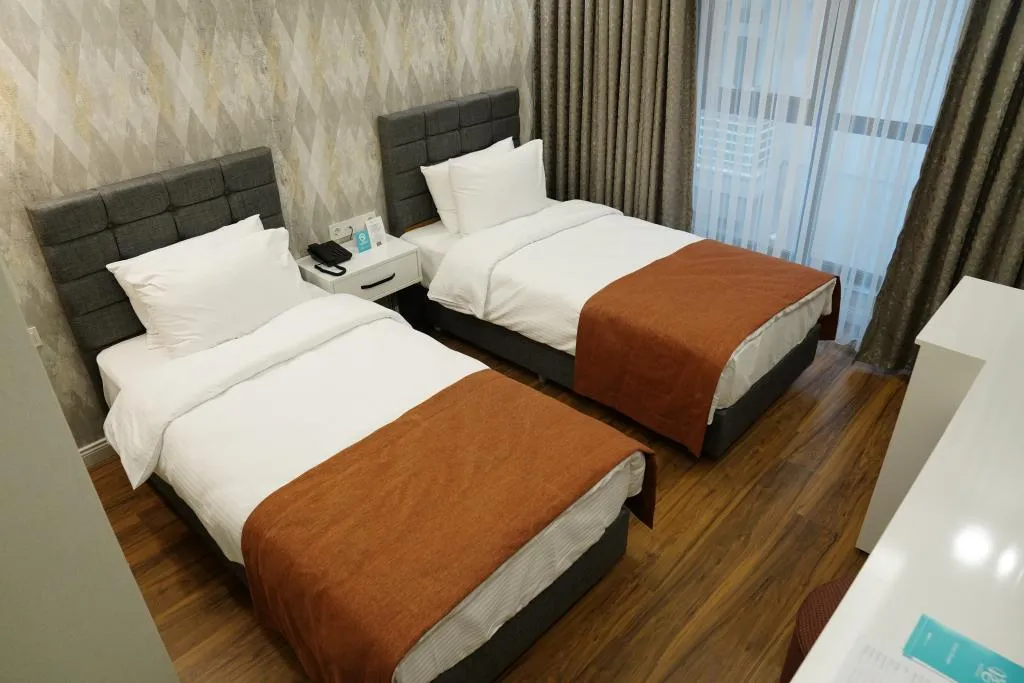 Standart Tek Kişilik İki Ayrı Yataklı Oda