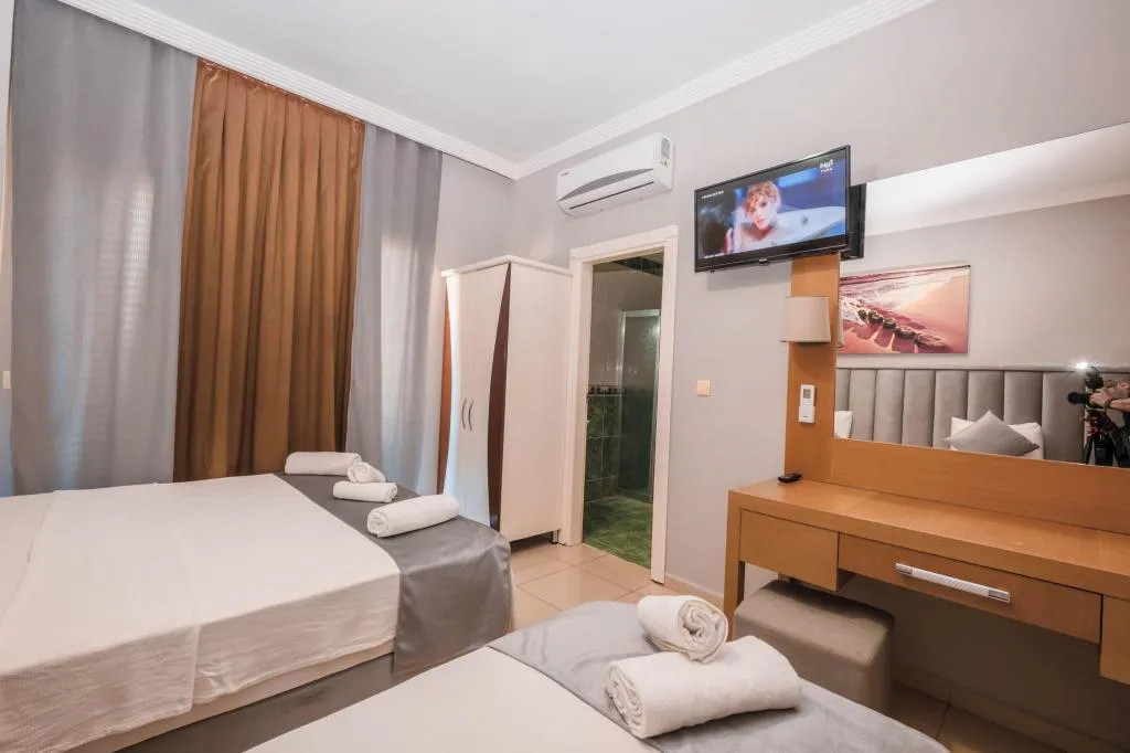 Deluxe Triple Room,Şehir veya Dağ Manzaralı,Balkonlu