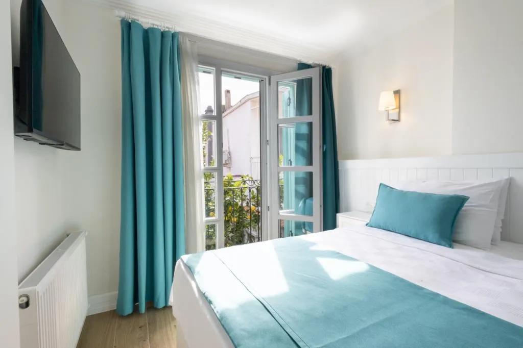 Deluxe Oda Balkonlu,Bahçe Manzaralı,Fransız Balkonlu