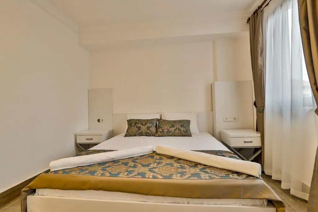 Standart Üç Kişilik Oda,Bahçe Manzaralı