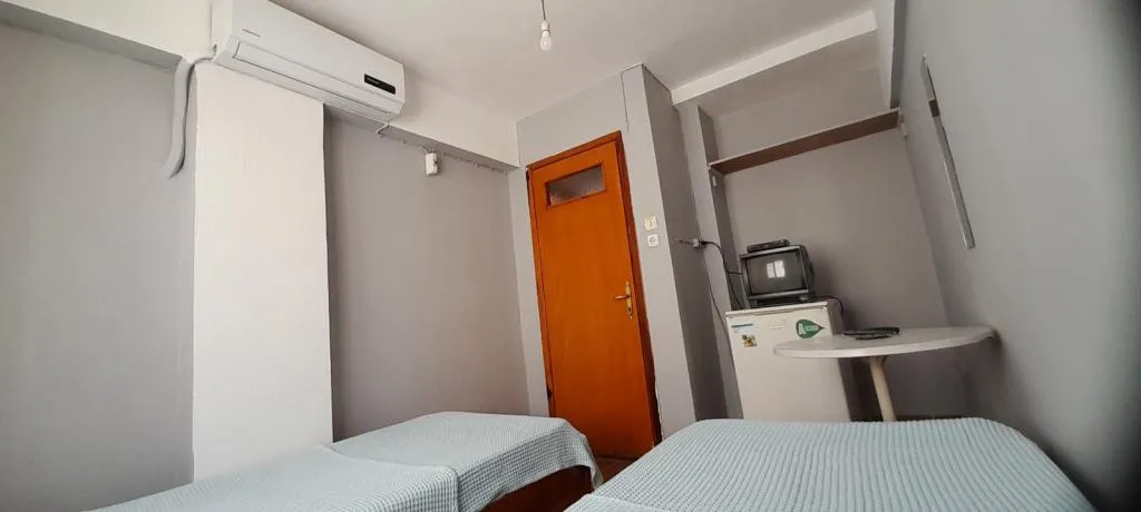 EKONOMİK İKİ AYRI YATAKLI PANSİYON ODASI (ORTAK BANYOLU)