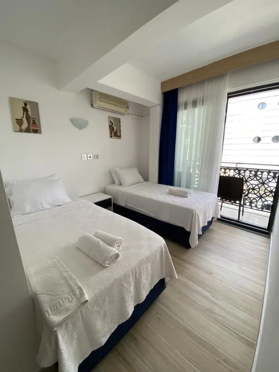 Standart Oda - İki Ayrı Yataklı,Bahçe Manzaralı,Balkonlu