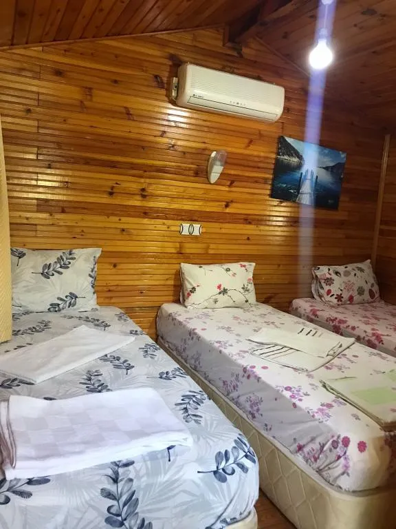 Üç Kişilik Oda