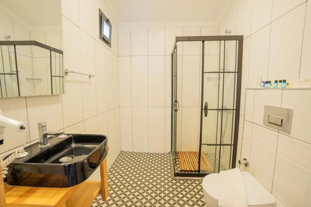 Superior Triple Room,Manzarasız,Balkonlu