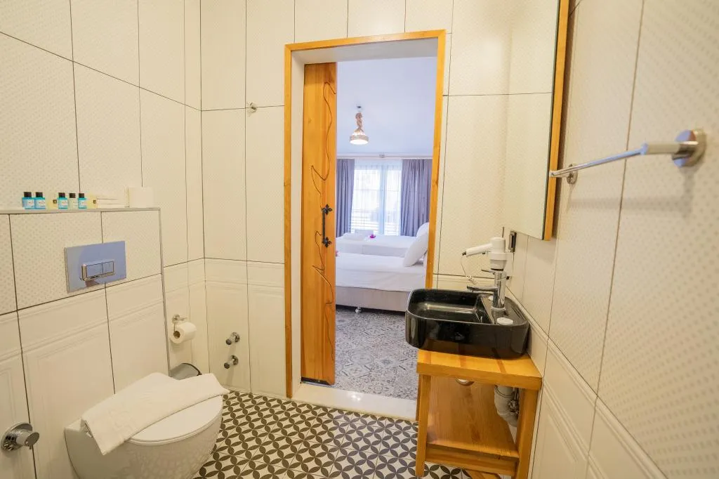 Superior Triple Room,Manzarasız,Balkonlu