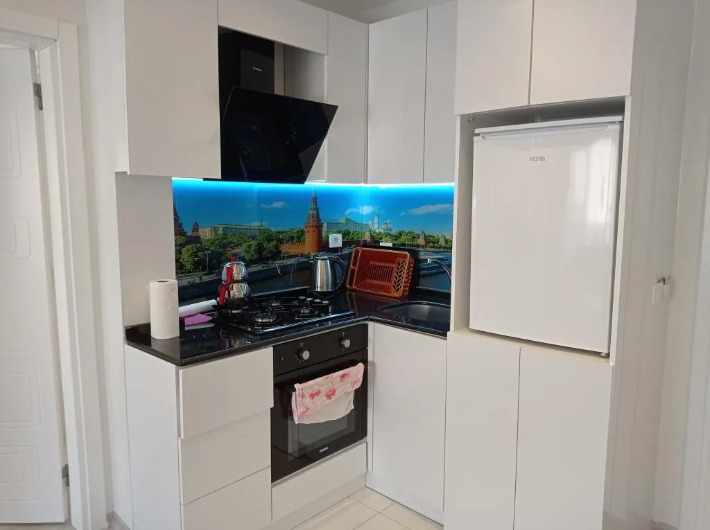 Daire-Tek Yatak Odalı,Bahçe Manzaralı,Fransız Balkonlu