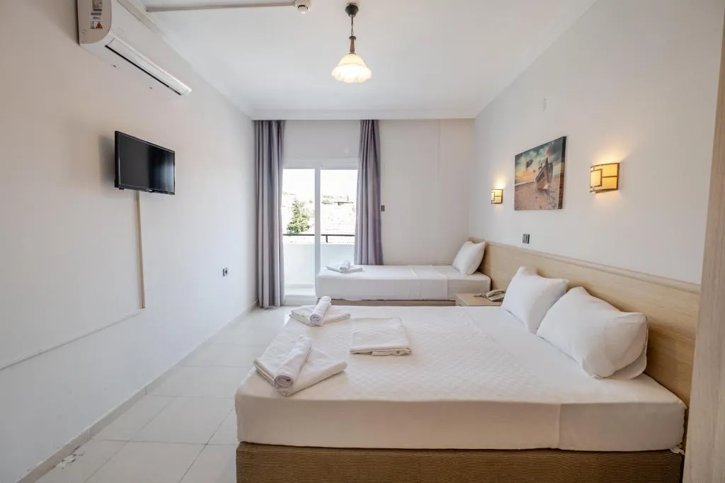 Standart Üç Kişilik Oda,Bahçe Manzaralı