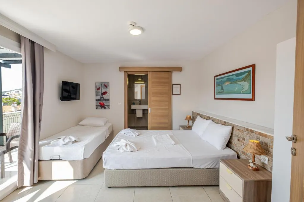 Standart Üç Kişilik Oda,Bahçe Manzaralı