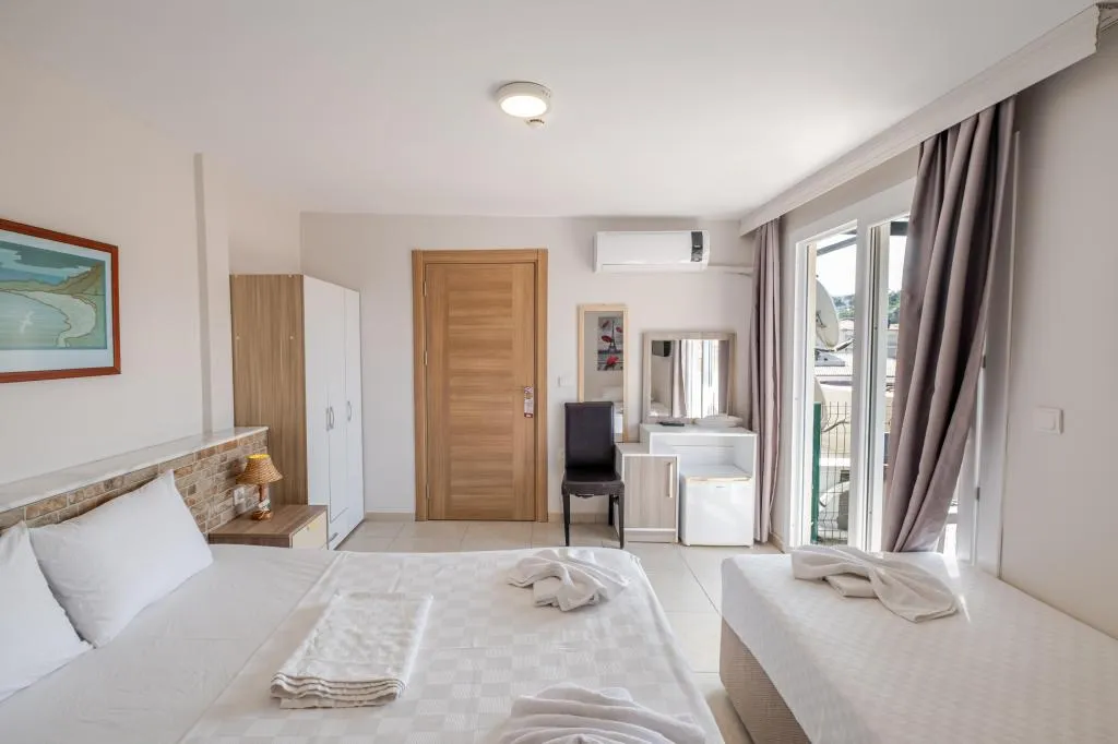 Standart Üç Kişilik Oda,Bahçe Manzaralı