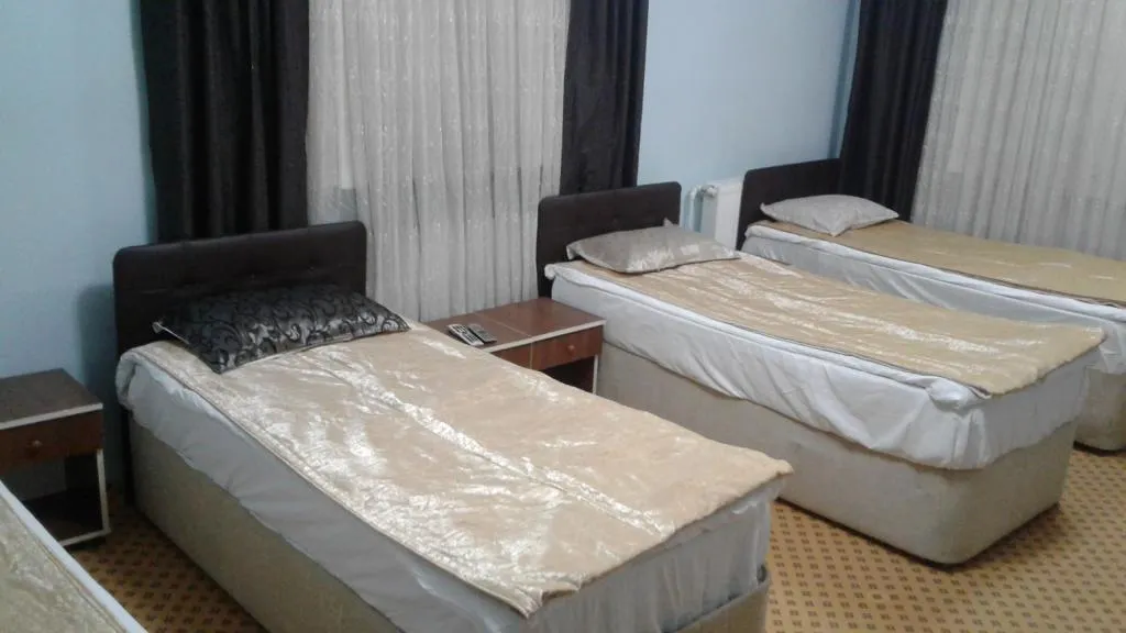 Standart Oda-Balkonsuz,Bahçe veya Sokak Manzaralı,İki Tek Kişilik Yataklı