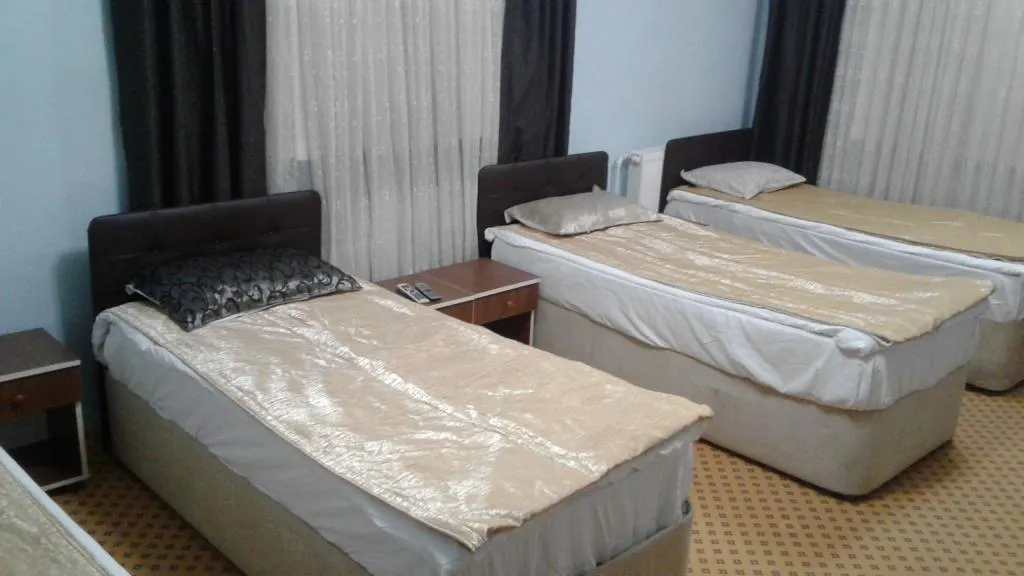 Standart Oda-Balkonsuz,Bahçe veya Sokak Manzaralı,İki Tek Kişilik Yataklı