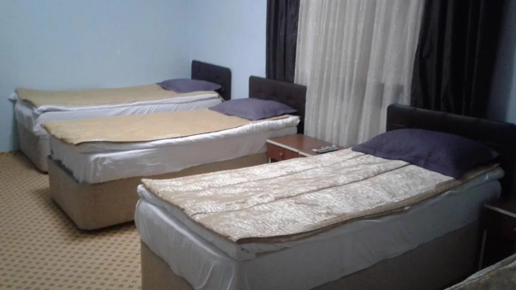 Standart Oda-Balkonsuz,Bahçe veya Sokak Manzaralı,İki Tek Kişilik Yataklı