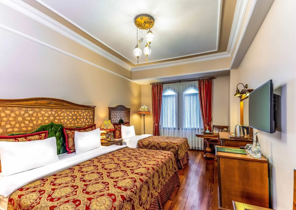 Deluxe Üç Kişilik Oda