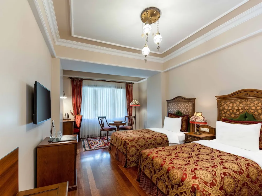 Deluxe Tek Büyük veya İki Ayrı Yataklı Oda