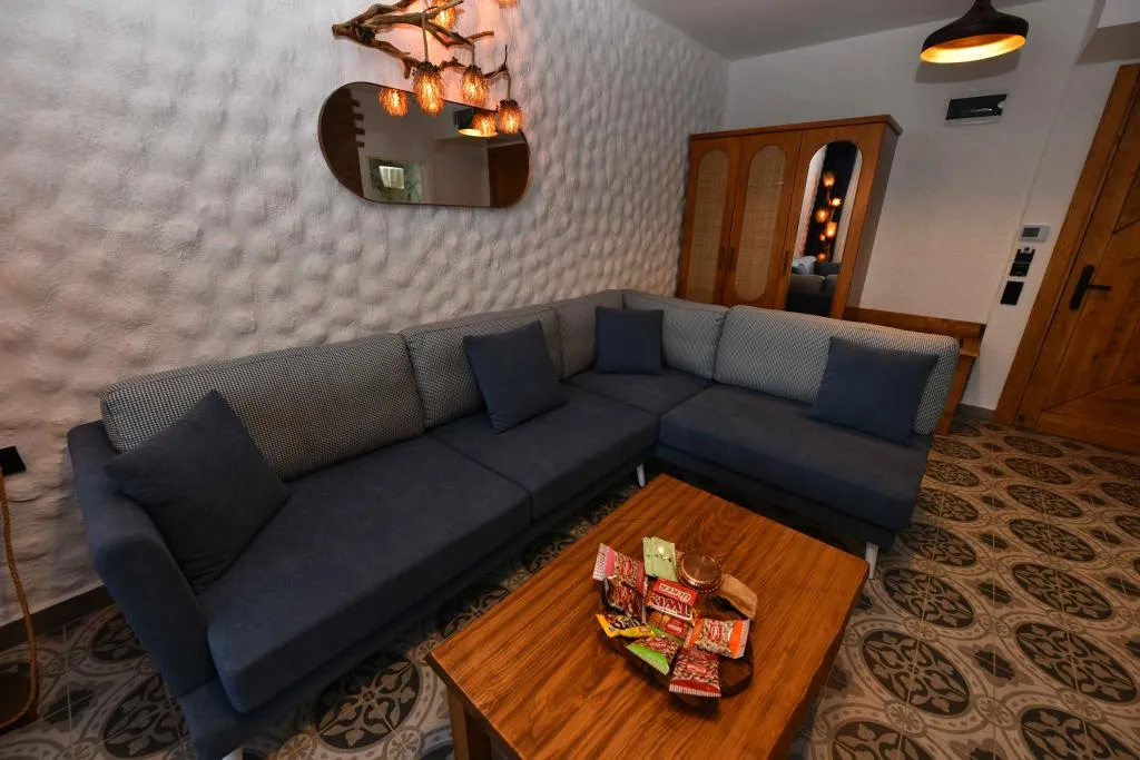 Jakuzili ve Şömineli Deluxe Oda,Deniz Manzaralı,Şömineli ve Jakuzili