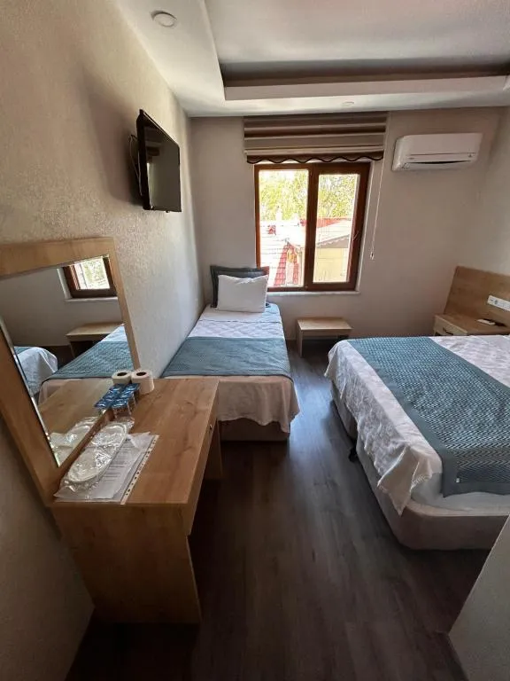 Üç Kişilik Oda