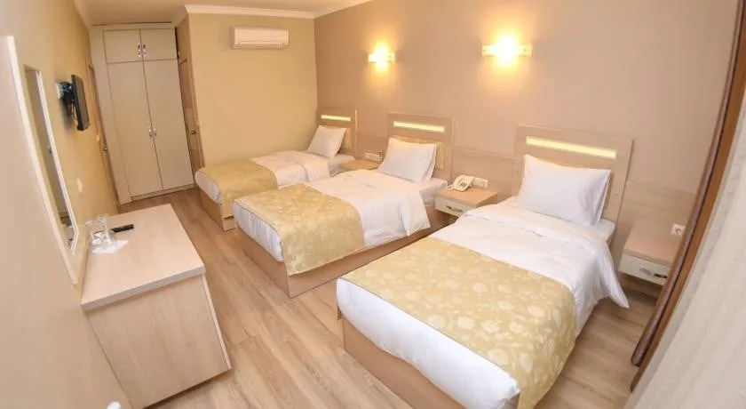 3 tek yataklı oda-Üç Kişilik Oda