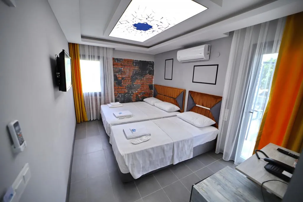Triple,Kısmi Deniz Manzaralı,Balkonlu