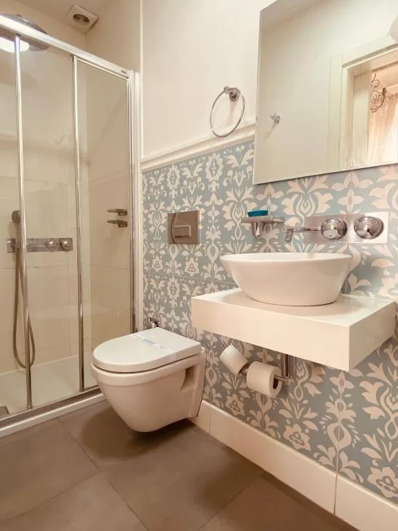 Deluxe Üç Kişilik Oda ,Şehir Manzaralı,Üst Kat