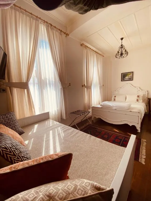 Deluxe Üç Kişilik Oda ,Şehir Manzaralı,Üst Kat