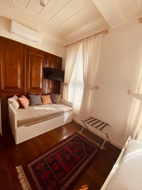 Deluxe Üç Kişilik Oda ,Şehir Manzaralı,Üst Kat