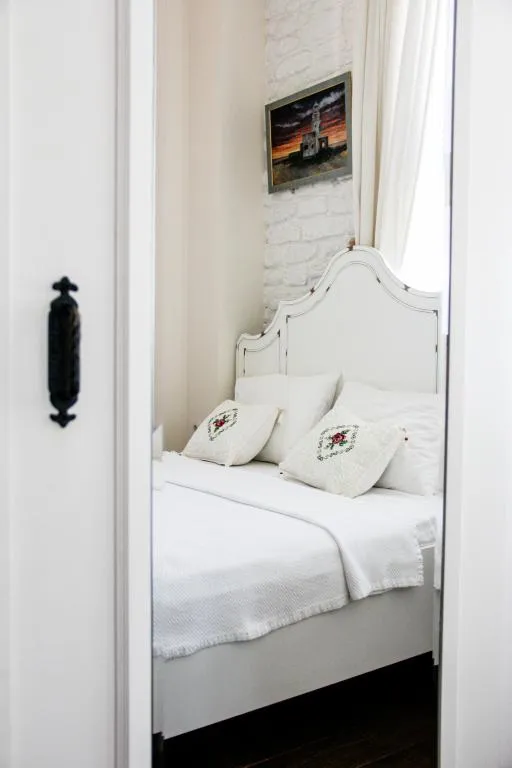 Deluxe Üç Kişilik Oda ,Şehir Manzaralı,Üst Kat