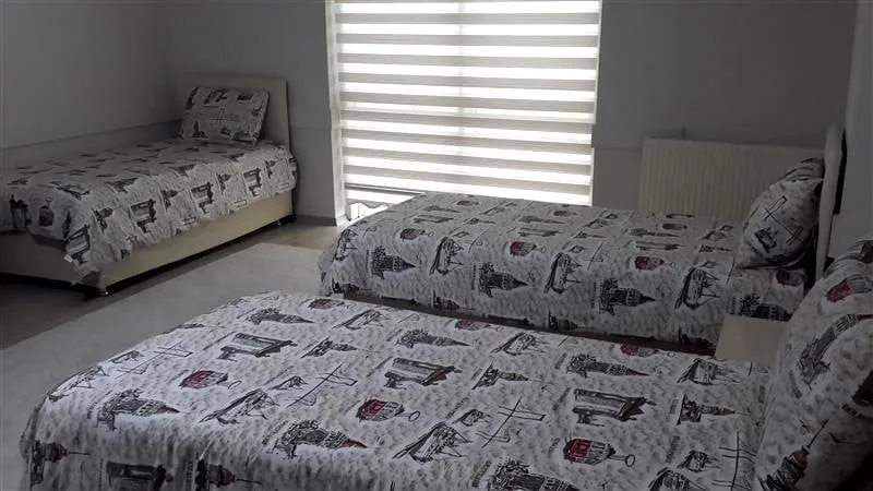 Üç Kişilik Oda