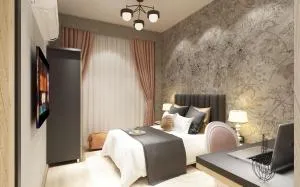The Queens Suite Hotel