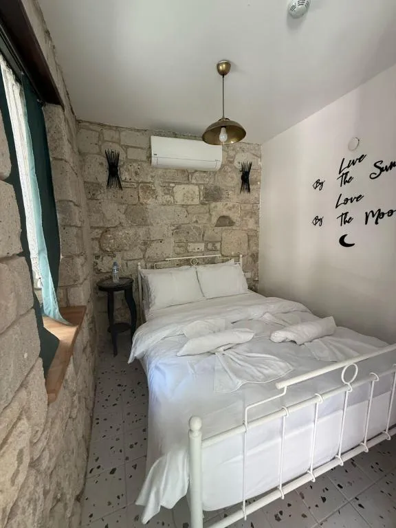 Standart Geniş Oda,Bahçe veya Sokak Manzaralı,Bahçe Katı