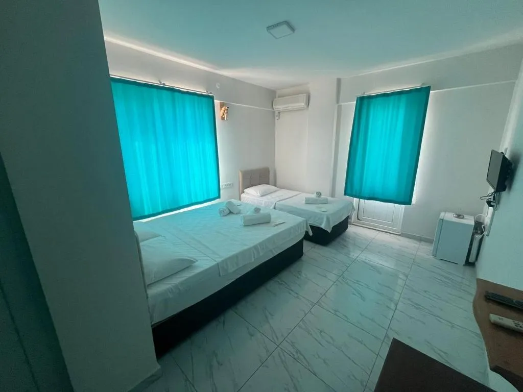 Standart Üç Kişilik Oda 1
