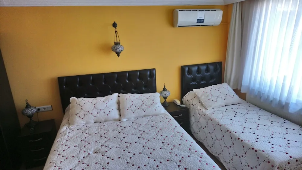 Triple Room With Balcony (On the 4th Floor, No Elevator)