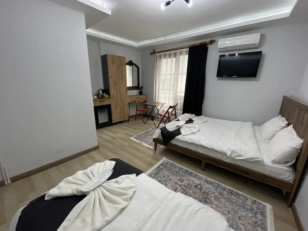 Deluxe Üç Kişilik Oda