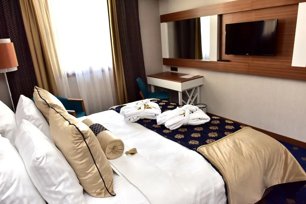 Deluxe Tek Büyük veya İki Ayrı Yataklı Oda