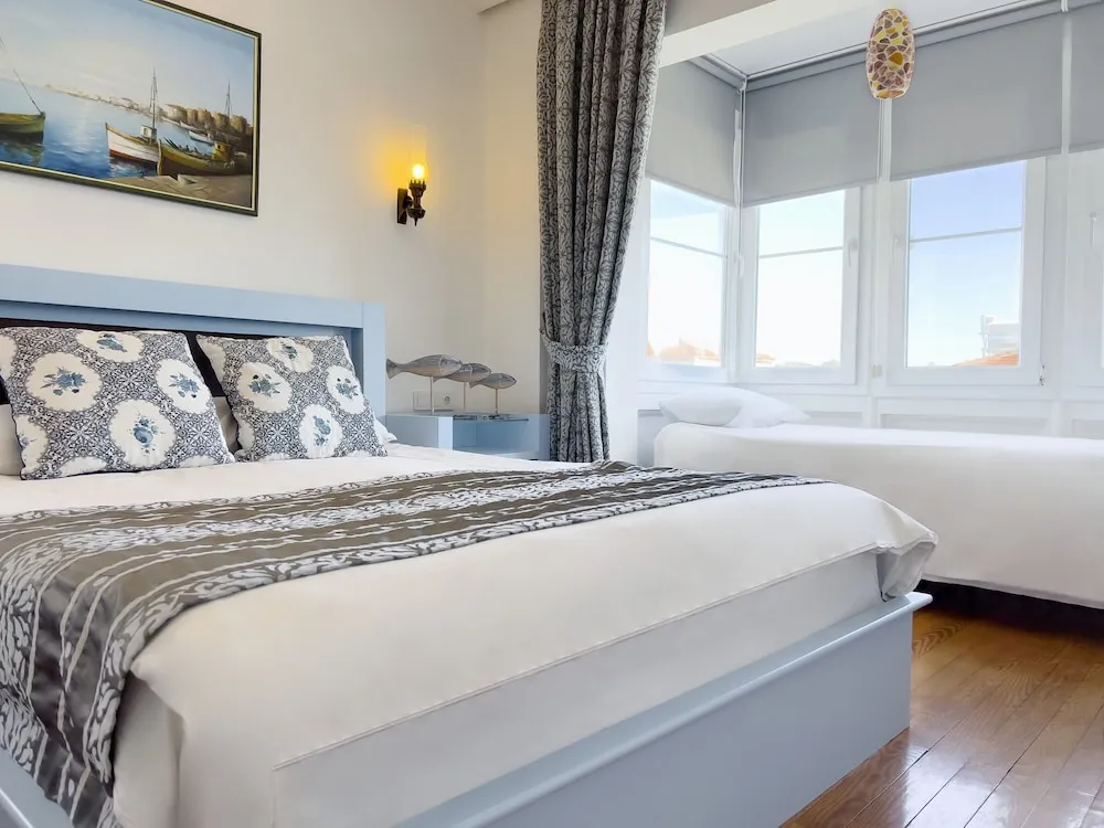 Deluxe Üç Kişilik Oda