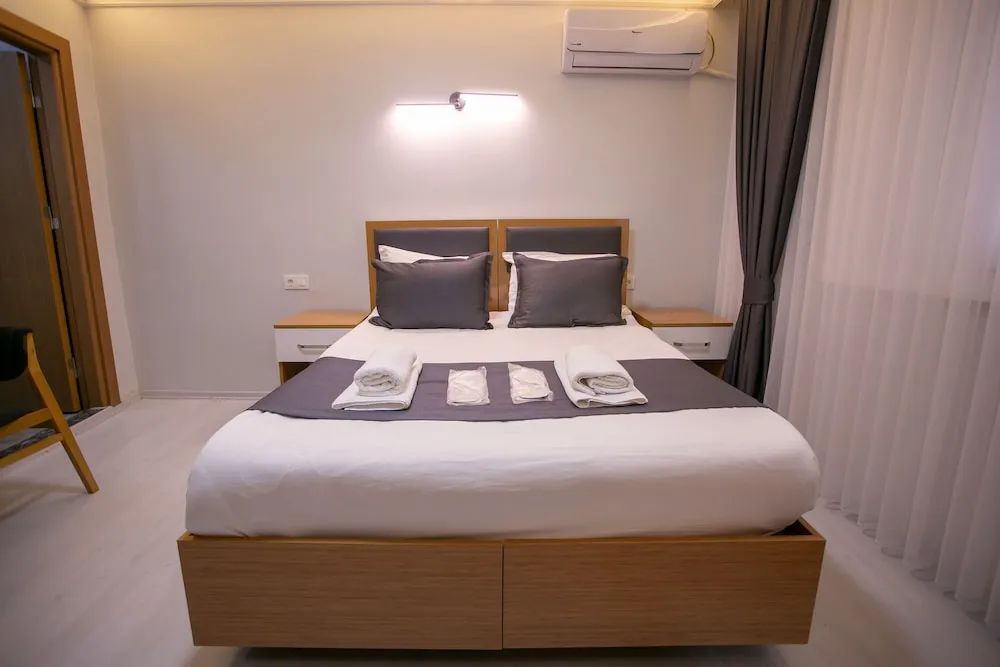 Deluxe Tek Büyük veya İki Ayrı Yataklı Oda