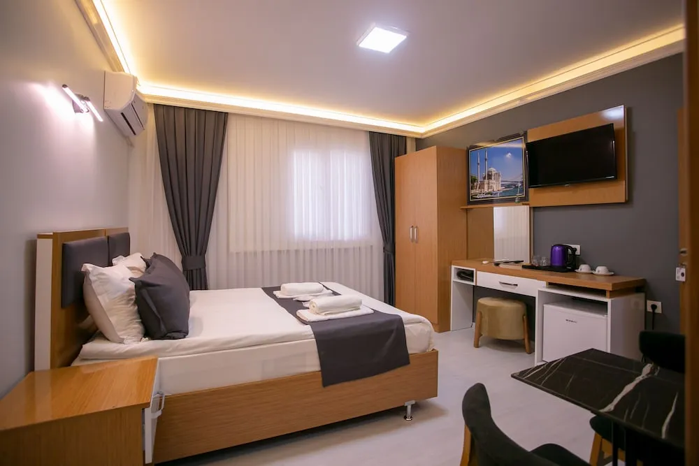 Deluxe Tek Büyük veya İki Ayrı Yataklı Oda