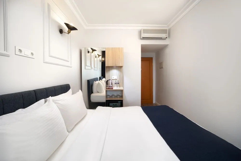 Deluxe Üç Kişilik Oda