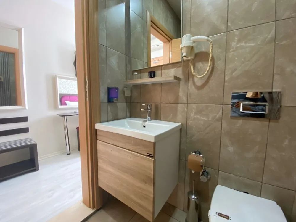 Deluxe Üç Kişilik Oda