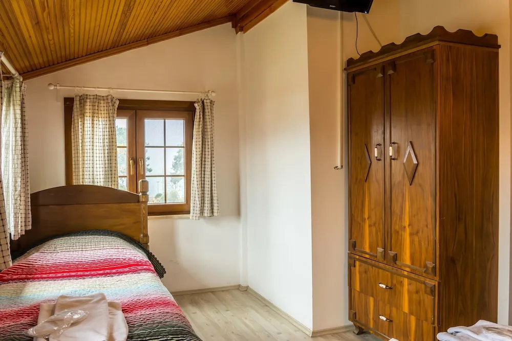 Deluxe Üç Kişilik Oda