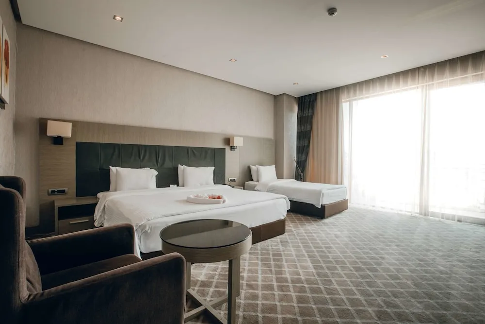 Business Tek Büyük veya İki Ayrı Yataklı Oda